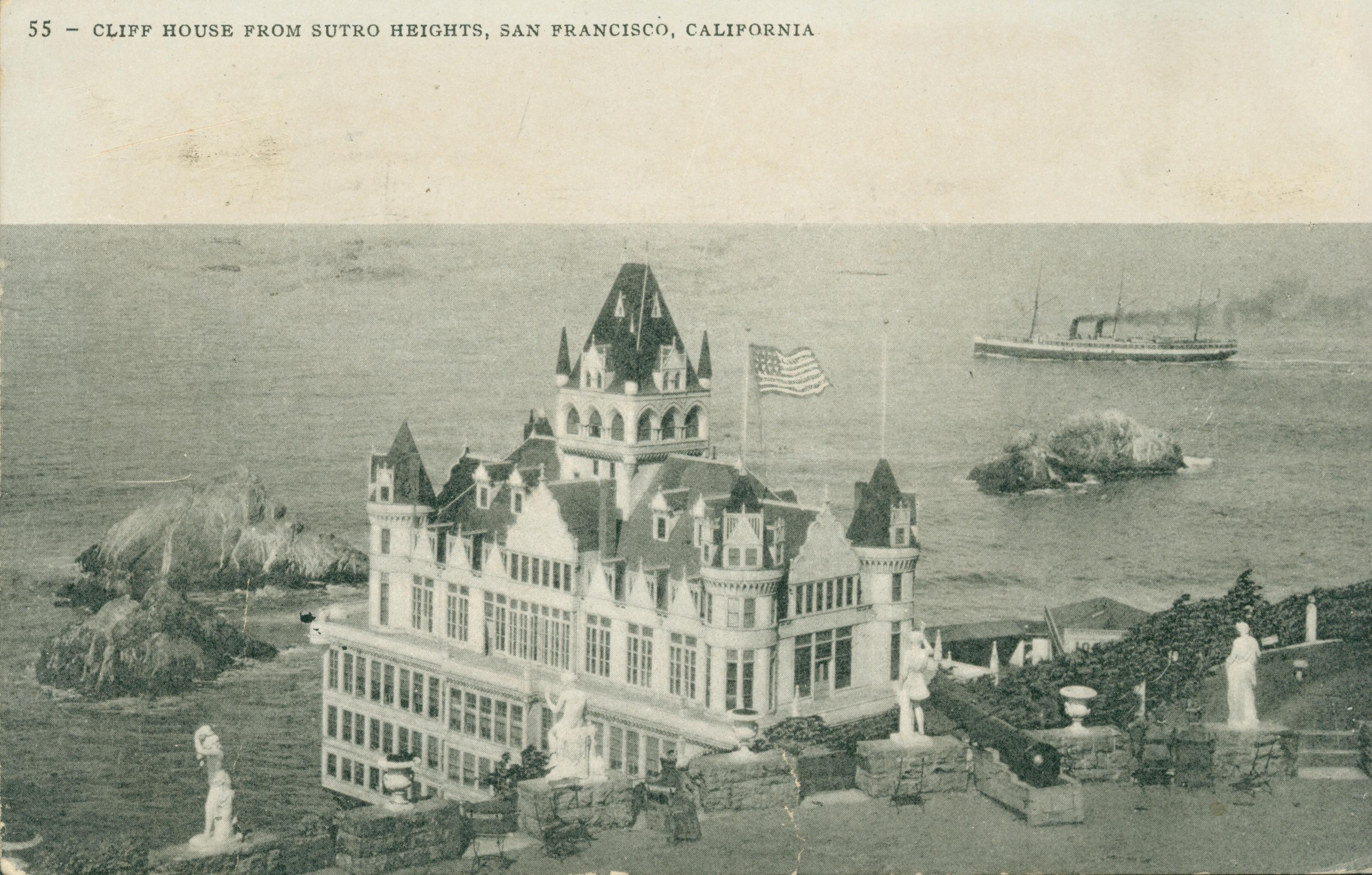 Shows the Cliff House and Seal Rocks, with the statues on Sutro Heights in the foreground.